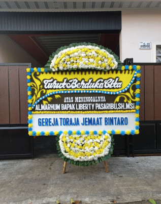 Papan Bunga Duka di Iring Mulyo